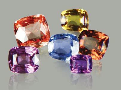 Colourful faceted sapphires that have undergone beryllium treatment.