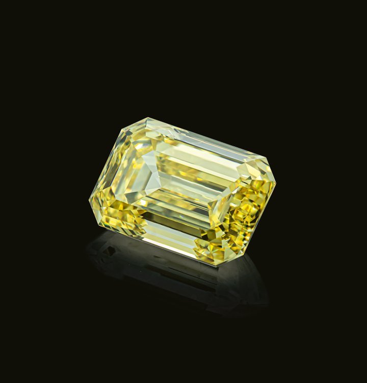 An exceptional 6-carat emerald-cut fancy vivid yellow diamond, exhibiting the highest colour intensity and timeless elegance.