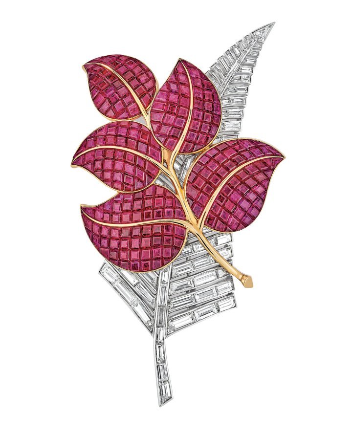 Fleur brooch in platinum, yellow gold, white gold, Mystery Set rubies and diamonds. 1936. Van Cleef & Arpels Collection.