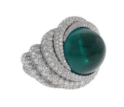 James Currens, J.W. Currens, Inc. - Platinum “Tropical Storm” ring featuring a 22.10 ct. Emerald accented with Diamonds (11.47 ctw.).