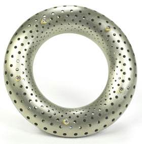 Gold Distinction 2nd Place winner Ezra Satok-Wolman of Atelier Hg & Co. Inc. in Ontario, Canada, used anticlastic raising techniques to create an 18k white gold torus brooch called Pythagoras' Cosmos to honor the ancient Greek mathematician, Pythagoras of Samos. The artist divided the torus mathematically to produce a hole pattern that mimics the phyllotaxis patterns observed in nature (phyllotaxis is the arrangement of leaves on a plant stem). 